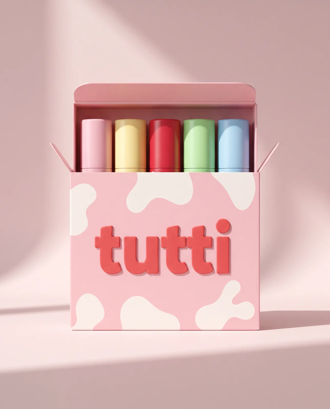 the tutti box — all five lipsticks in a milk-splash pink carton